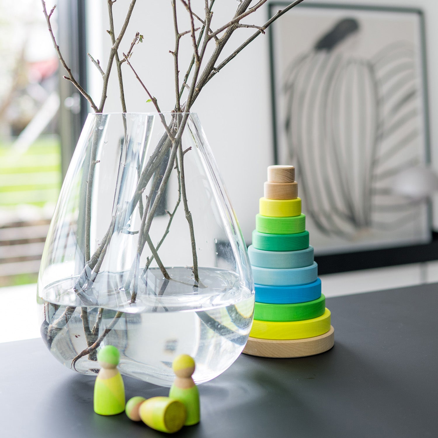 Grimm's Conical Stacking Tower - Neon Green - In a home environment. Grimm's Rainbows