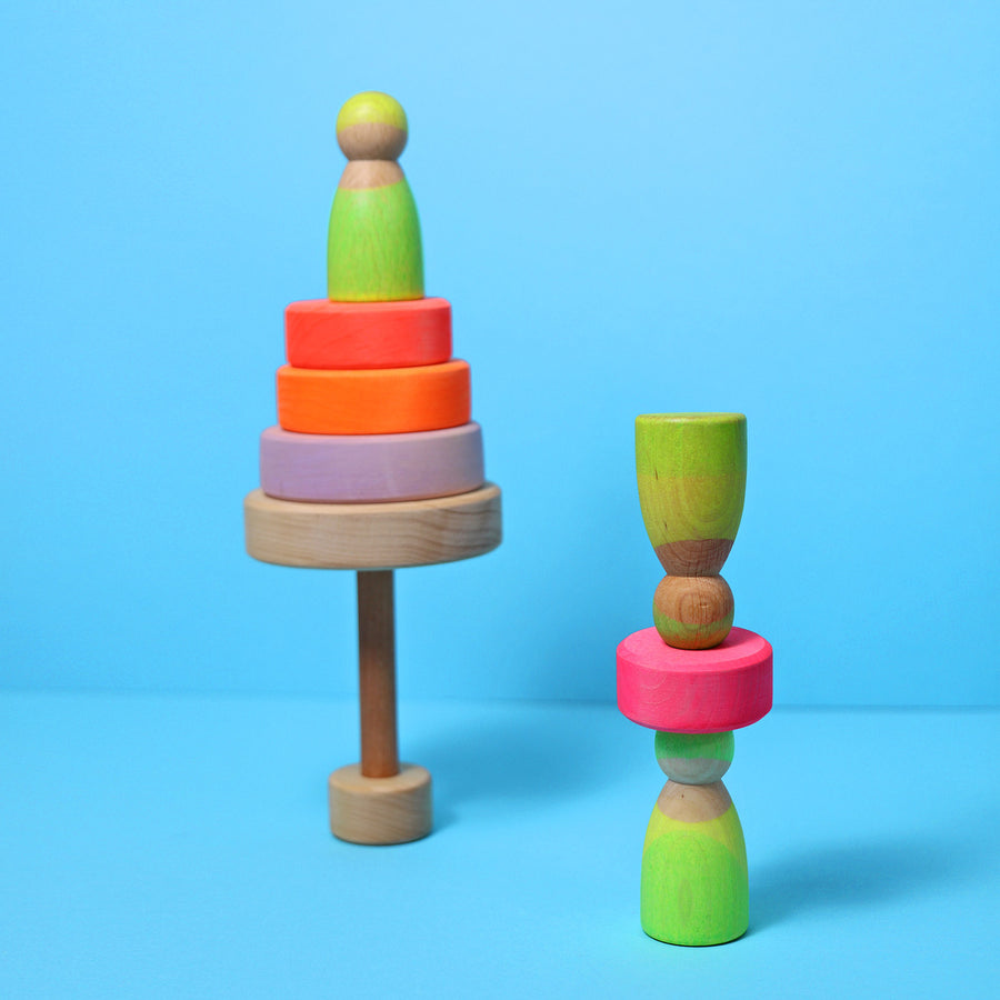 Tower toys and Neon friends are used together to make a play scene.