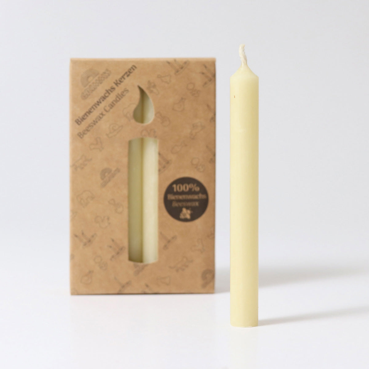 A pack of 12 Cream 100% beeswax candles in a cardboard box