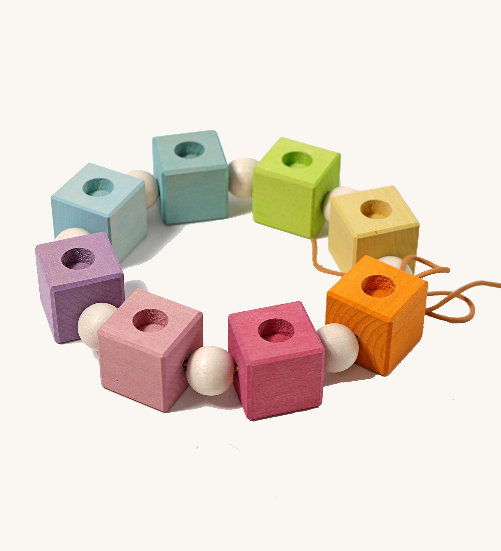 Grimm's Pastel Coloured Birthday Cubes Celebration Ring on a plain background. 