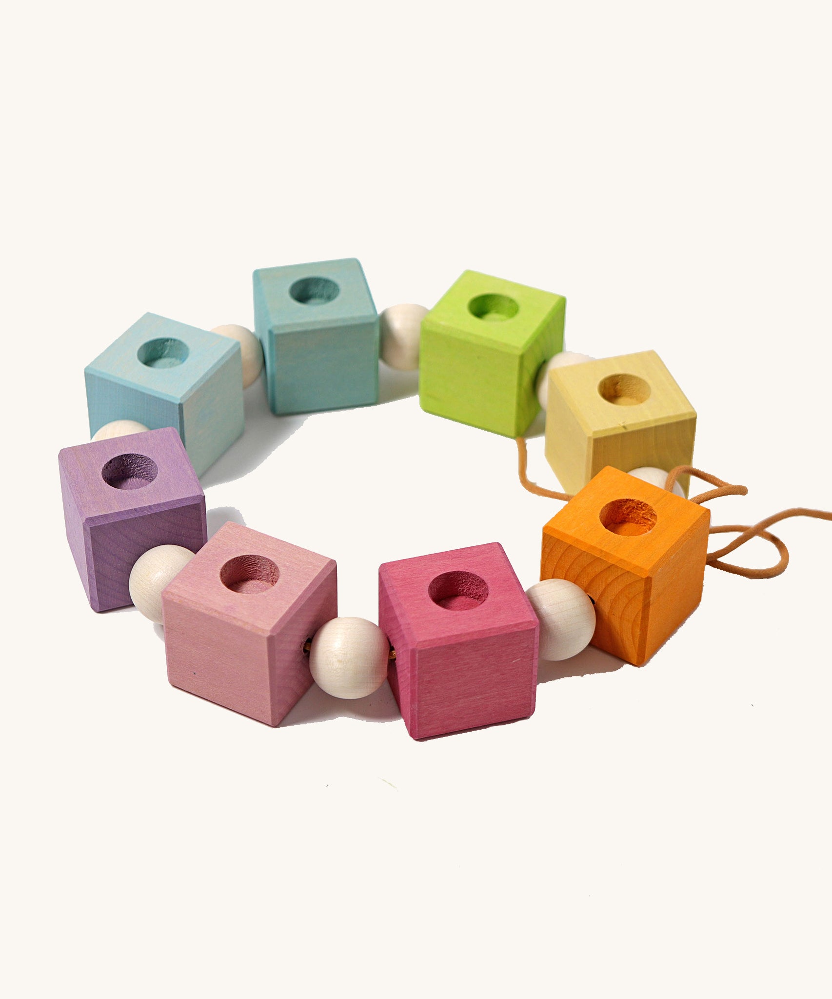 Grimm's Pastel Coloured Birthday Cubes Celebration Ring on a plain background. 