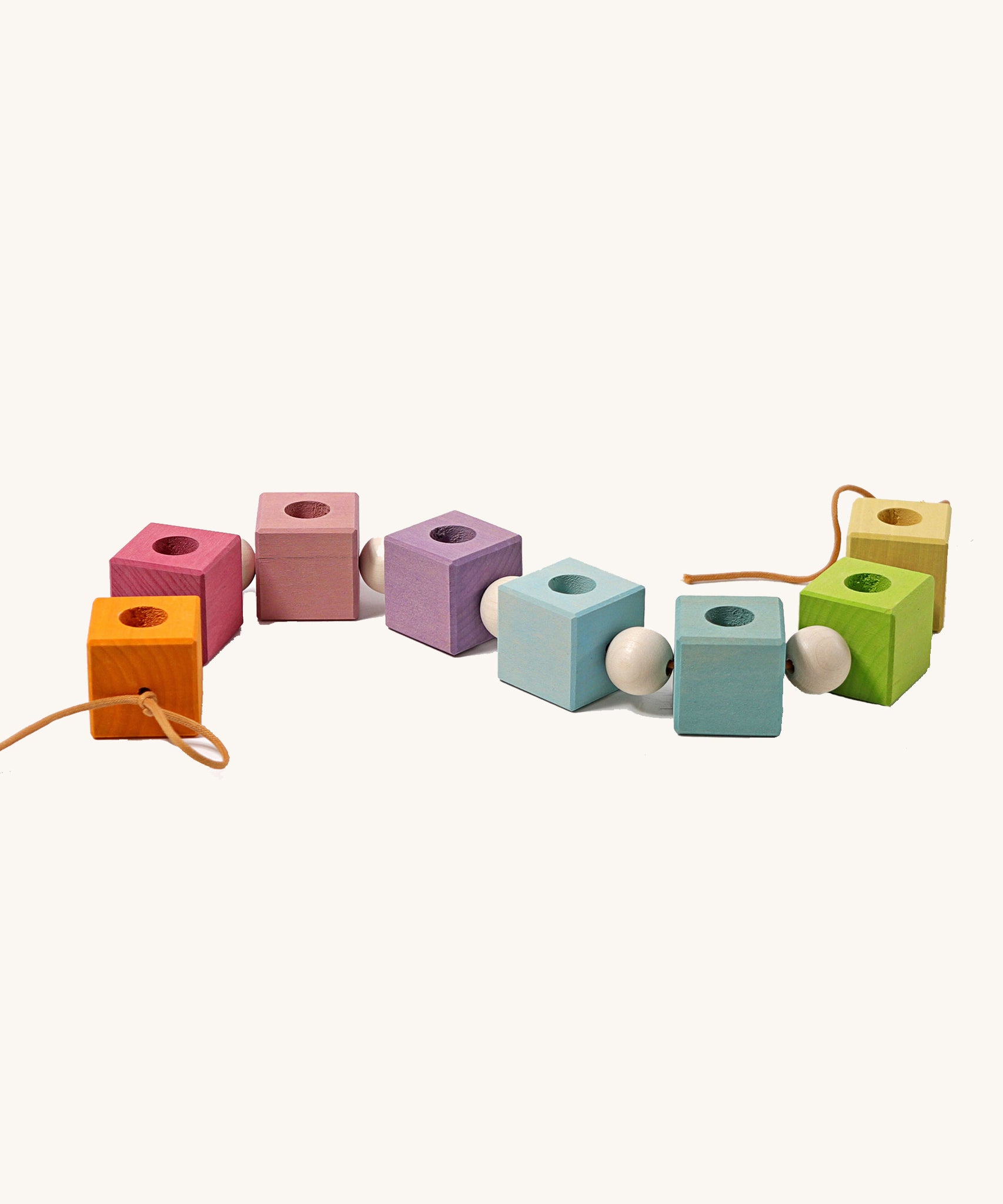 Grimm's Pastel Coloured Birthday Cubes Celebration Ring on a plain background. 