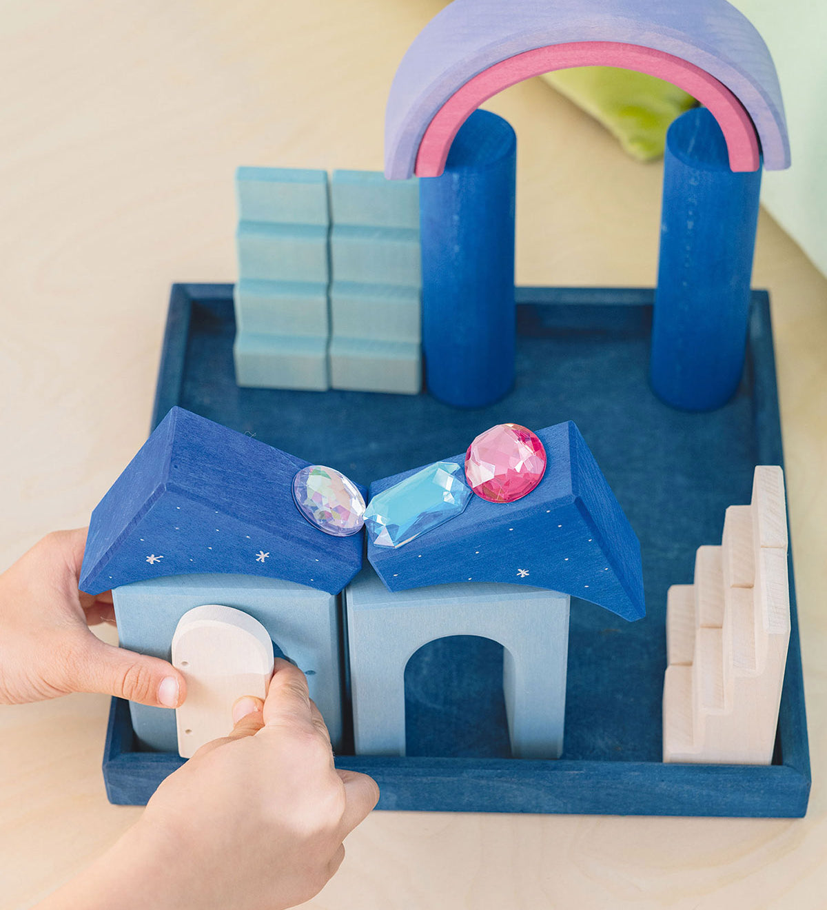 dark navy tray holds the Polar Light blocks which consist of various coloured blocks in different shapes and sizes