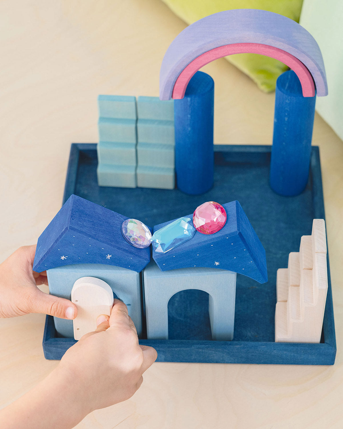 dark navy tray holds the Polar Light blocks which consist of various coloured blocks in different shapes and sizes