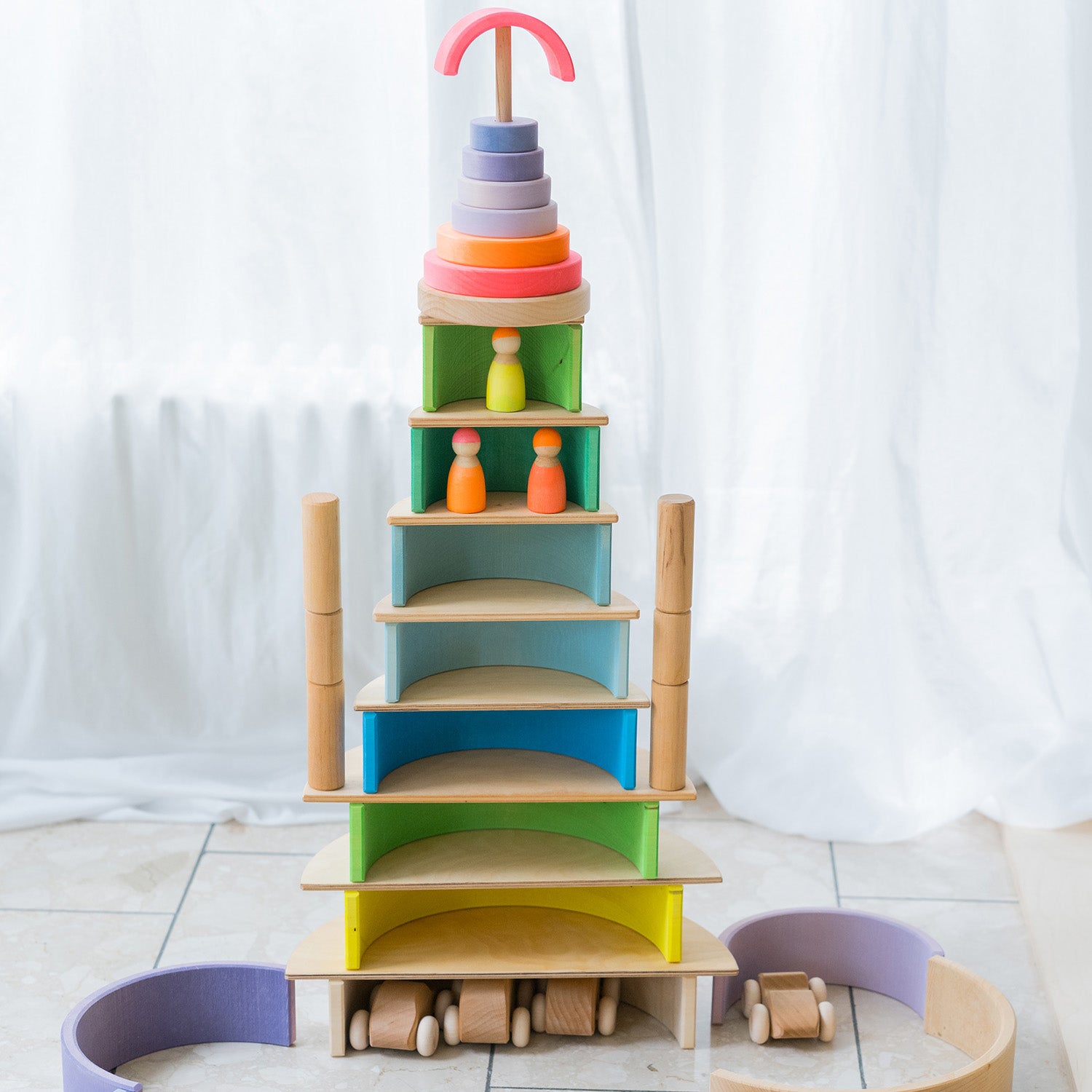 Tower toys and Neon friends are used together to make a play scene.