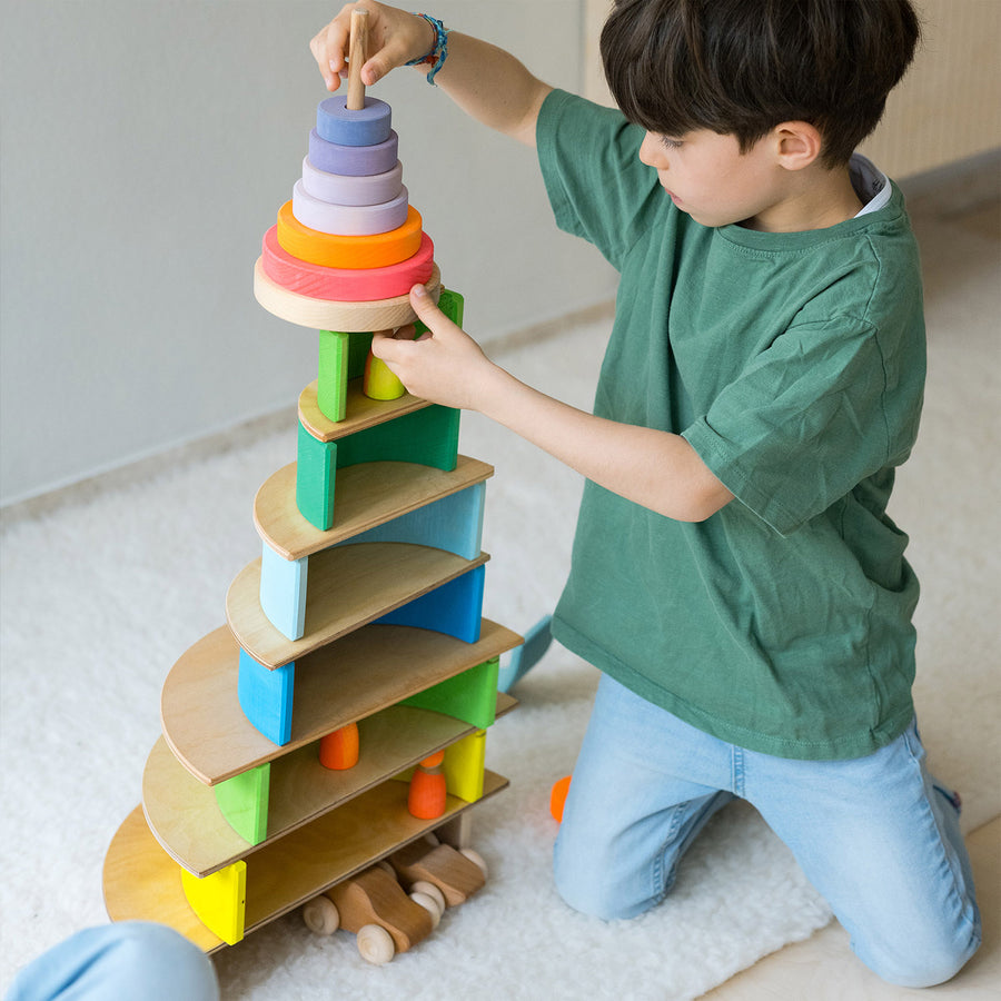 orange yellow and green displayed on a white stand with blue background.