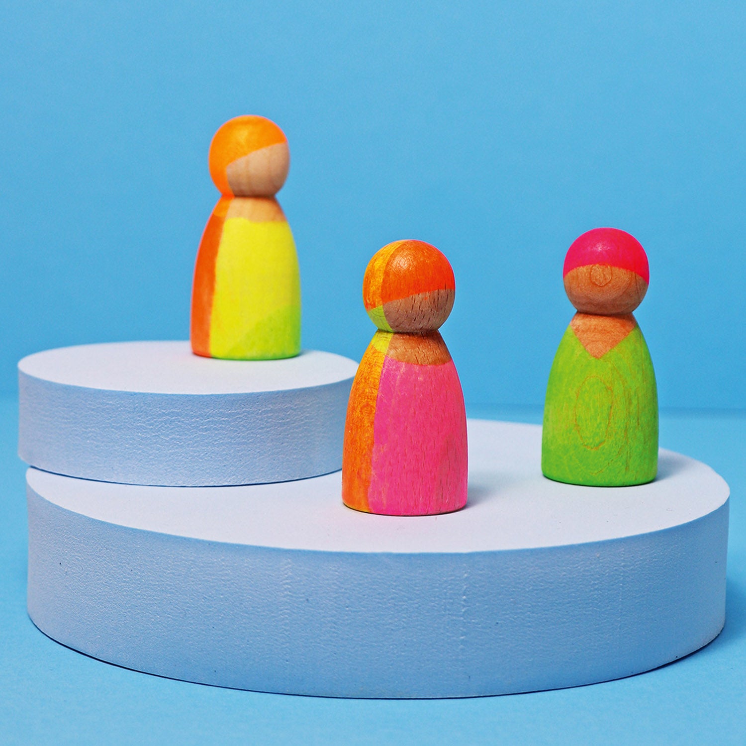 Grimm's 3 Friends Wooden Peg People in a Neon Mix of colours in pink