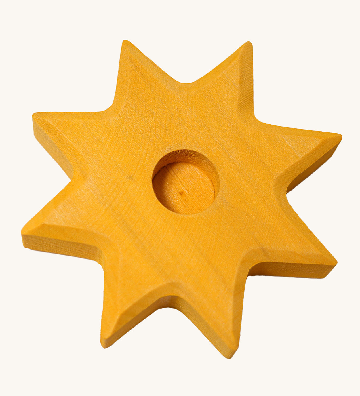 Grimm's Yellow Lifelight Star decorative figure holder on a plain background.