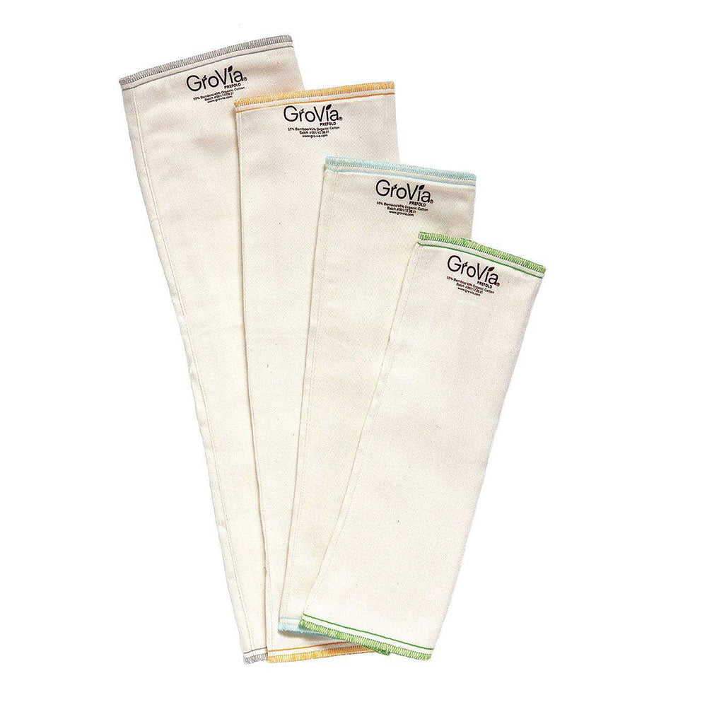 Grovia eco-friendly prefold nappy cloths laid out in a fan on a white background