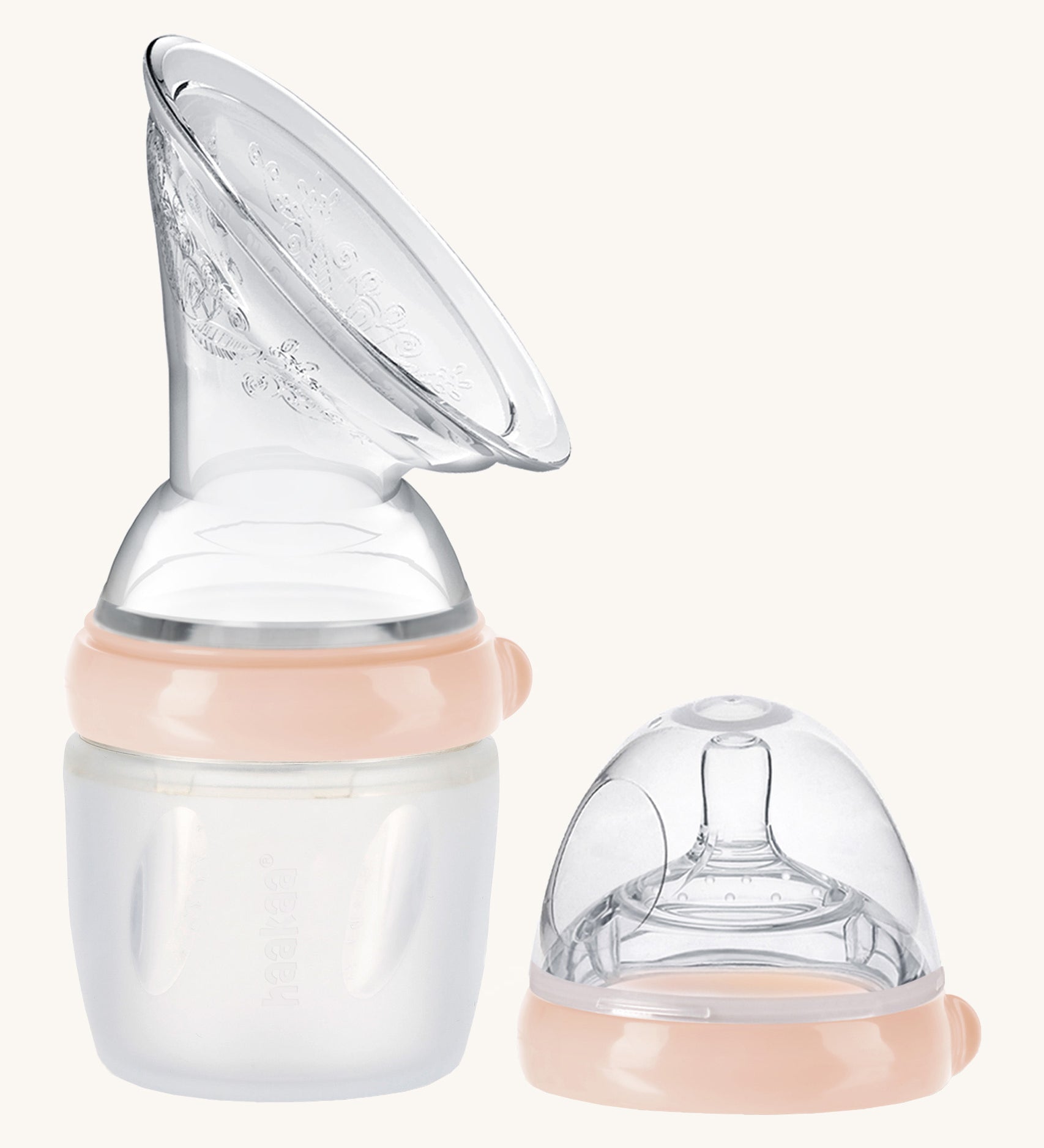 Generation 3 160ml Breast Pump and Baby Bottle Top Set, in peach on a cream background. This set come with the Haakaa Gen. 3 Silicone Breast Pump and Baby Bottle Top.