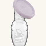 Haakaa Generation 1 100ml Silicone Breast Pump with a light purple cap