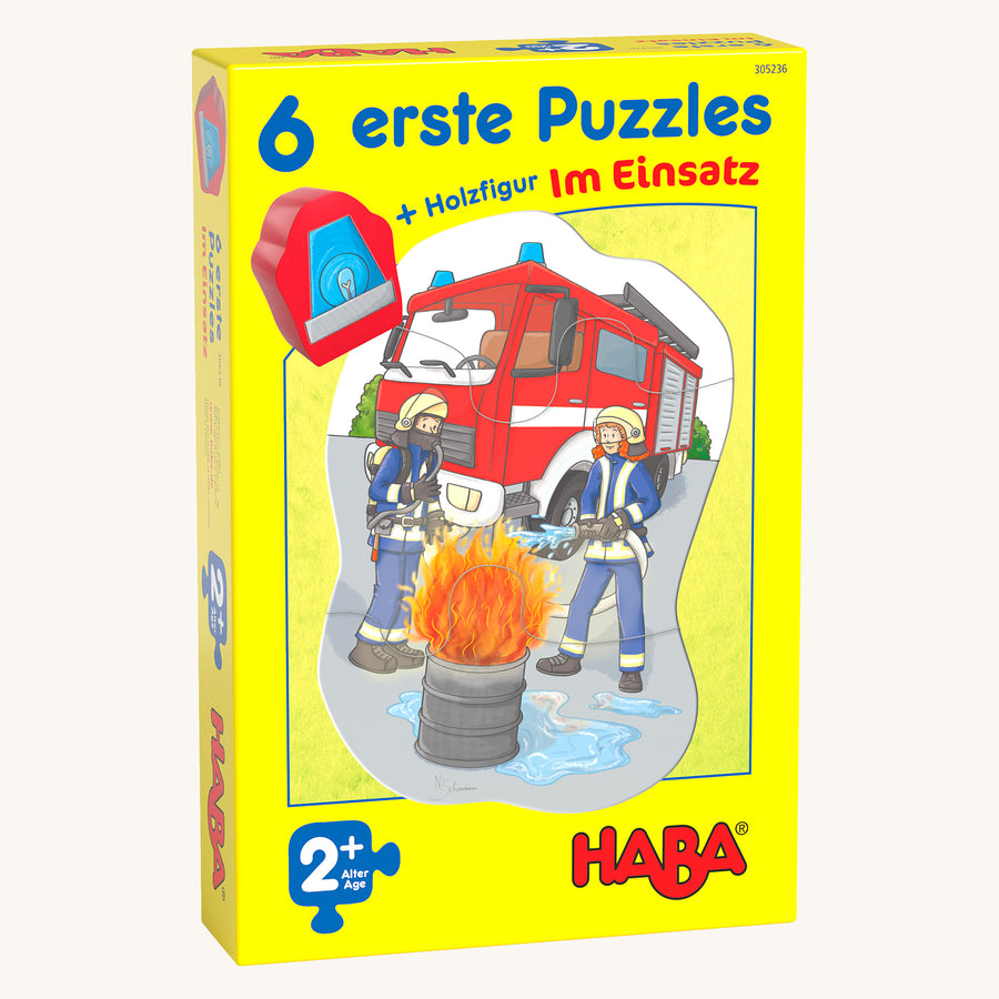 HABA 6 Little Hands Jigsaw - In Action. A fun jigsaw with various Public Services jigsaw scenes such as a paramedic, fire fighter, police officer, post person, vehicle recovery driver, bin collector and a wooden block with an emergency light painted on th