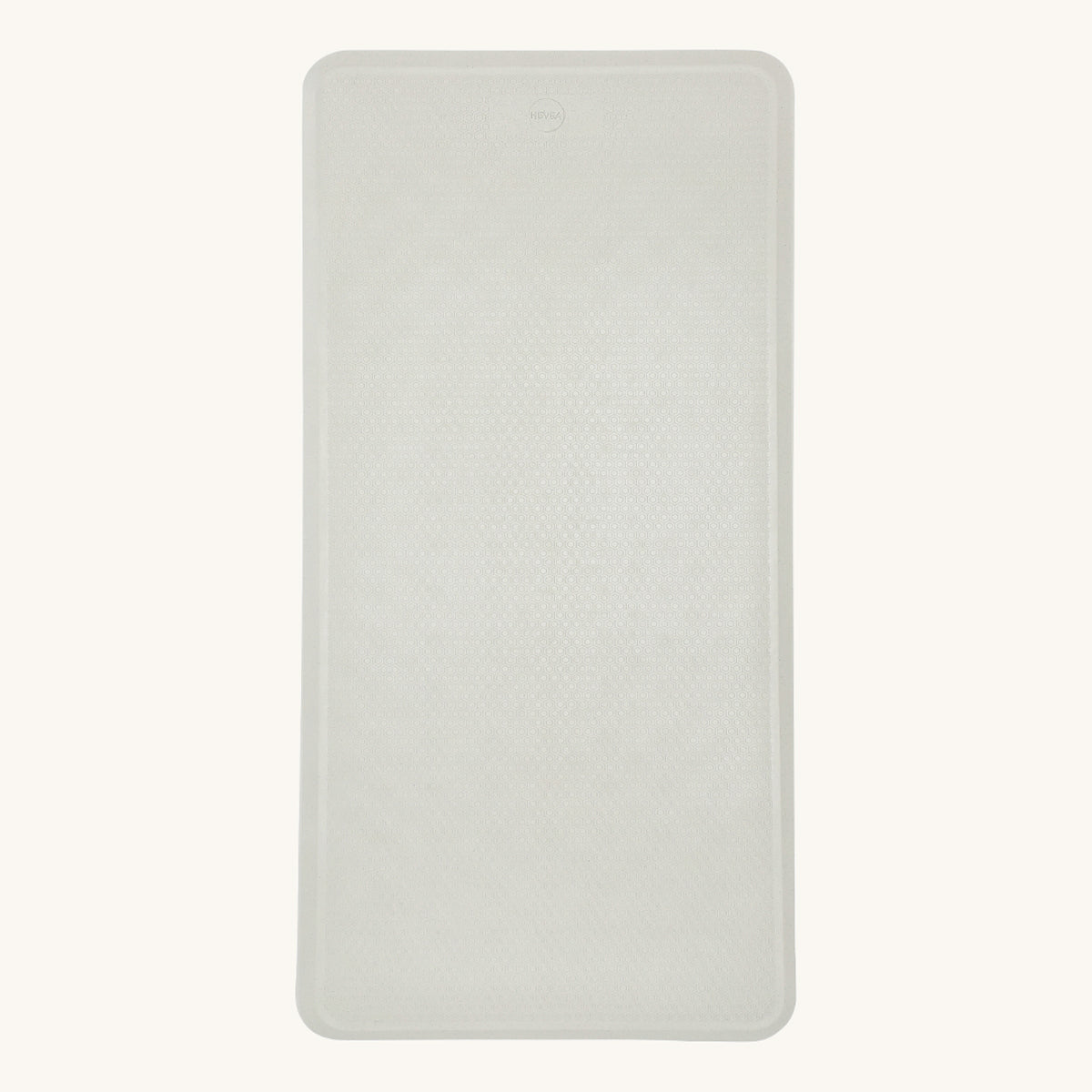 Hevea natural rubber bath mat in the marble grey on a beige background