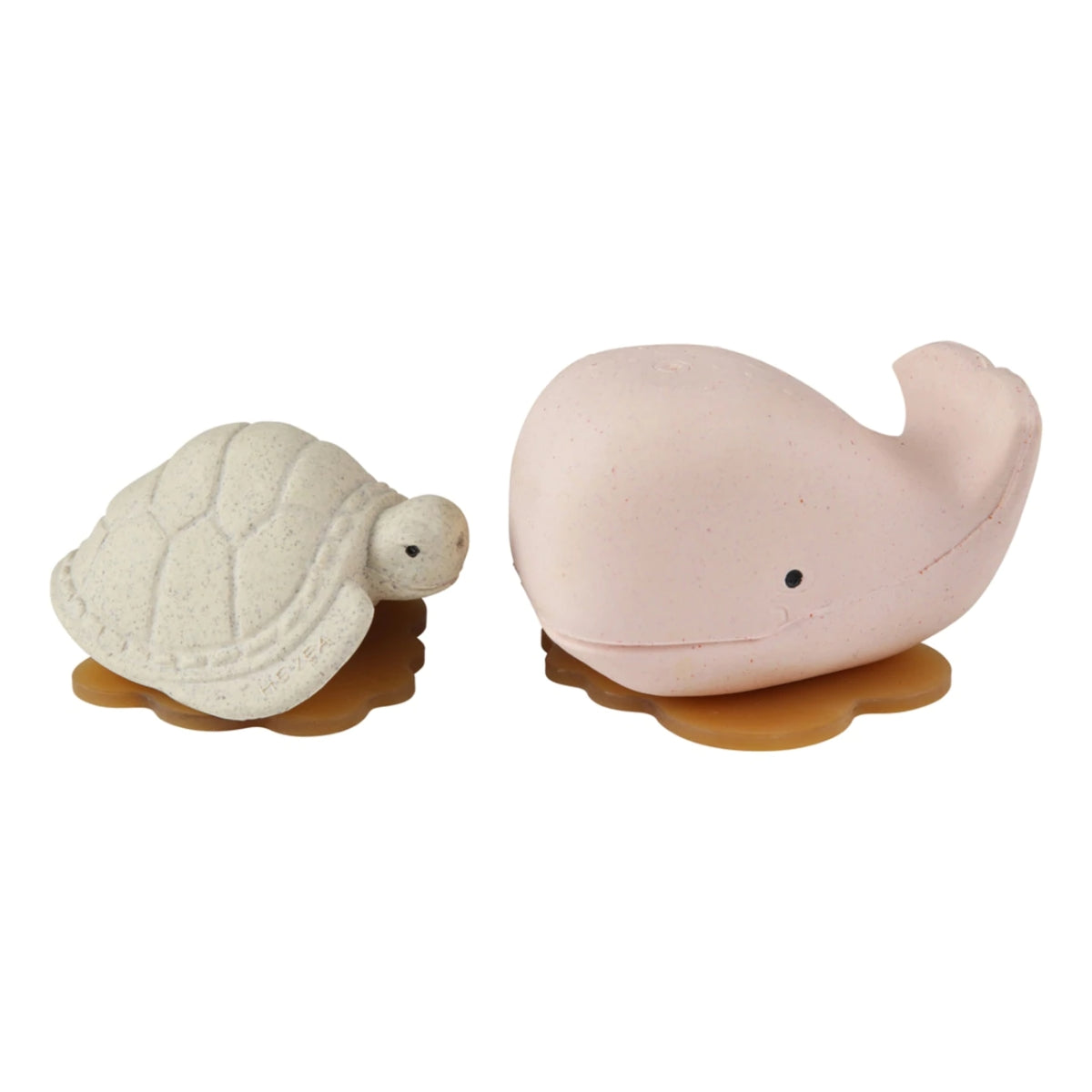 A picture of the Hevea Squeeze'n'splash Whale & Turtle rubber Bath toys in Champagne Pink and Vanilla