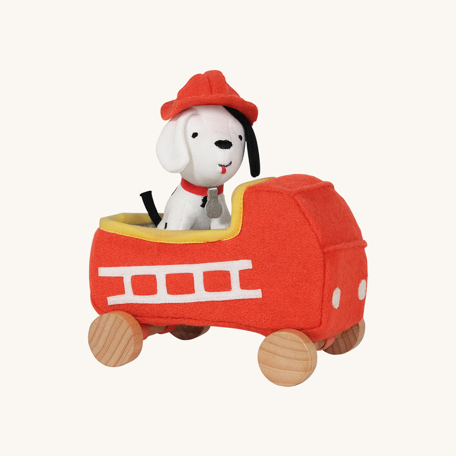 Olli Ella Holdie Dog-go Chief in a red felt fire truck with wooden wheels