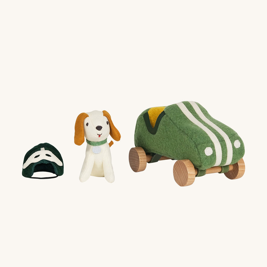 Olli Ella Holdie Dog-go Racer Boy in a green felt racing car with wooden wheels and white stripes