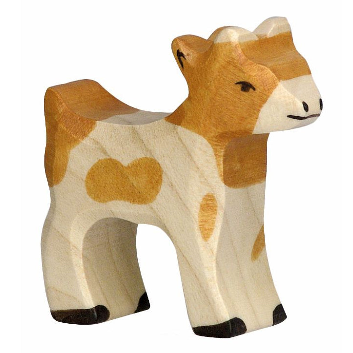 The Holztiger Goatling wooden figure is a Waldorf wooden goat kid with brown and white fur, smart black hooves and little horn buds.