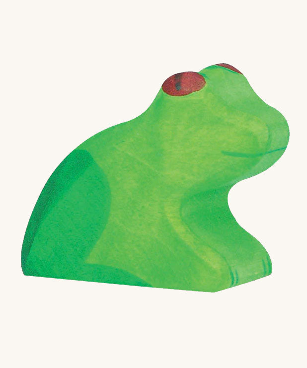 The Holztiger wooden toy frog figure on a plain background. 