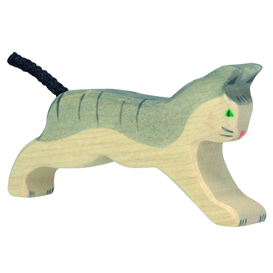 The Holztiger Running Cat is a wooden figure painted grey and white with faint stripes on the body, green eyes and a rope tail. 