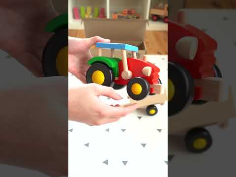 The Bajo wooden tractor and Trailer toy