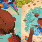 Pages of the I am Brown childrens book open on a white background