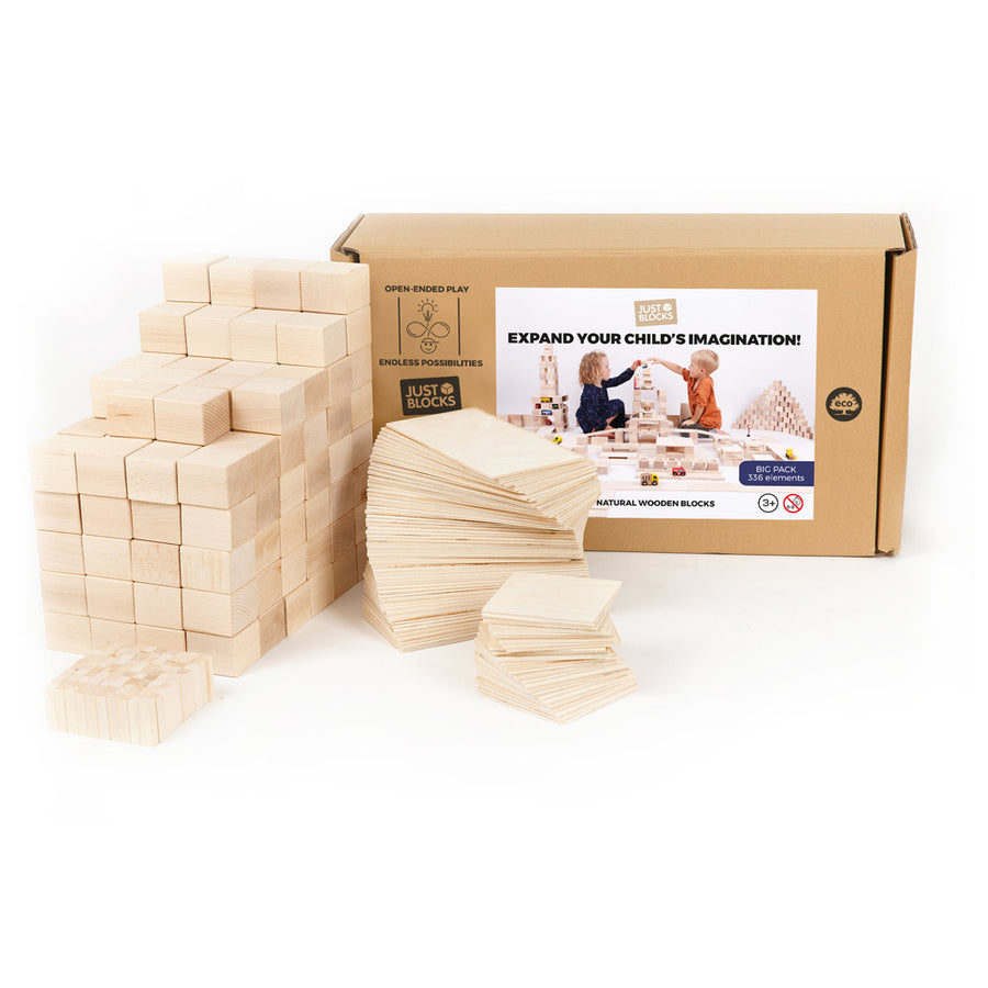 Just blocks large 336 wooden toy shapes set stacked in a pile next to their cardboard box on a white background