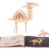 Kapla beginner art book open in front of a wooden camel model on a white background