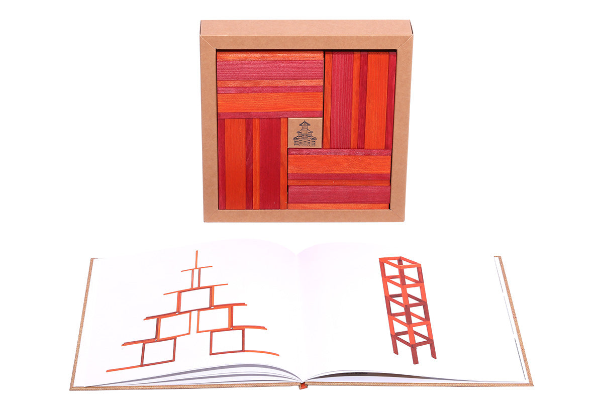 Kapla red and orange book and block set spread out on a white background