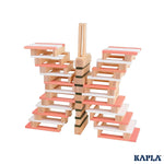 A butterfly shaped stack created using the wooden blocks from the KAPLA 200 Box wooden building planks in Spring colours