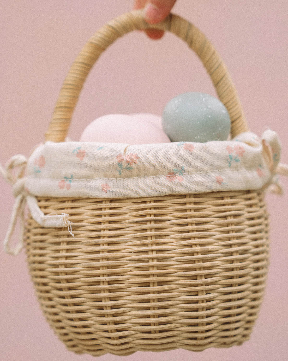 A child happily playing an egg hunt