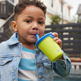 A child drinking out of a Klean Kanteen Steel Kid Cup with Straw Lid.