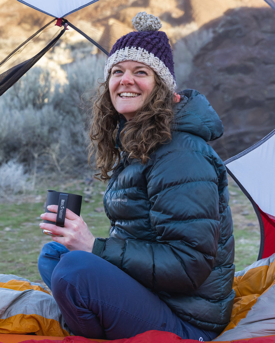 An adult holding the Klean Kanteen 12oz Insulated Camping Mug