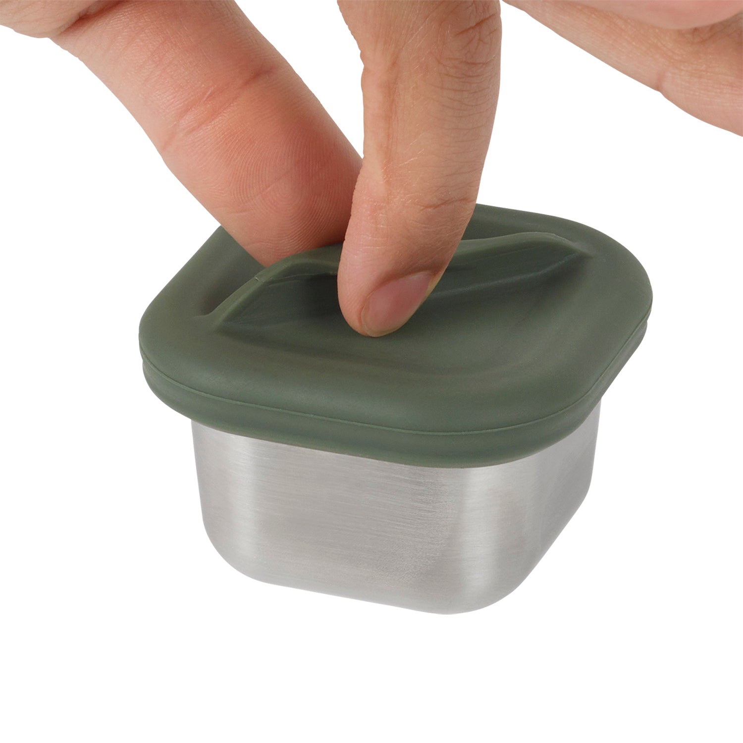 Klean Kanteen Rise Stainless Steel Half Snack Box with fingers gripping the green silicone lid