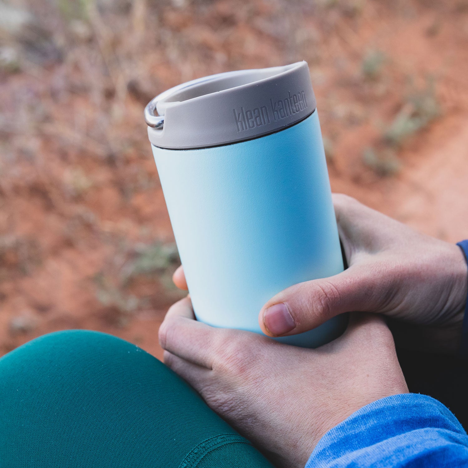 A Klean Kanteen TKWide Café Cap in a grey Taupe colour pictured on a TKWide bottle.