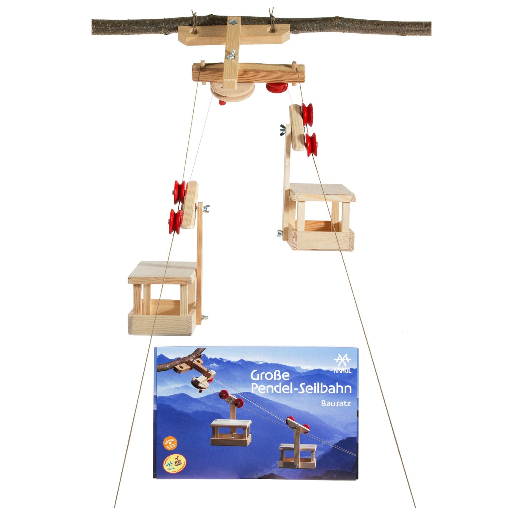 Picture of a boy playing with the Kraul Big Cable Car Set with Two Cars and Station.