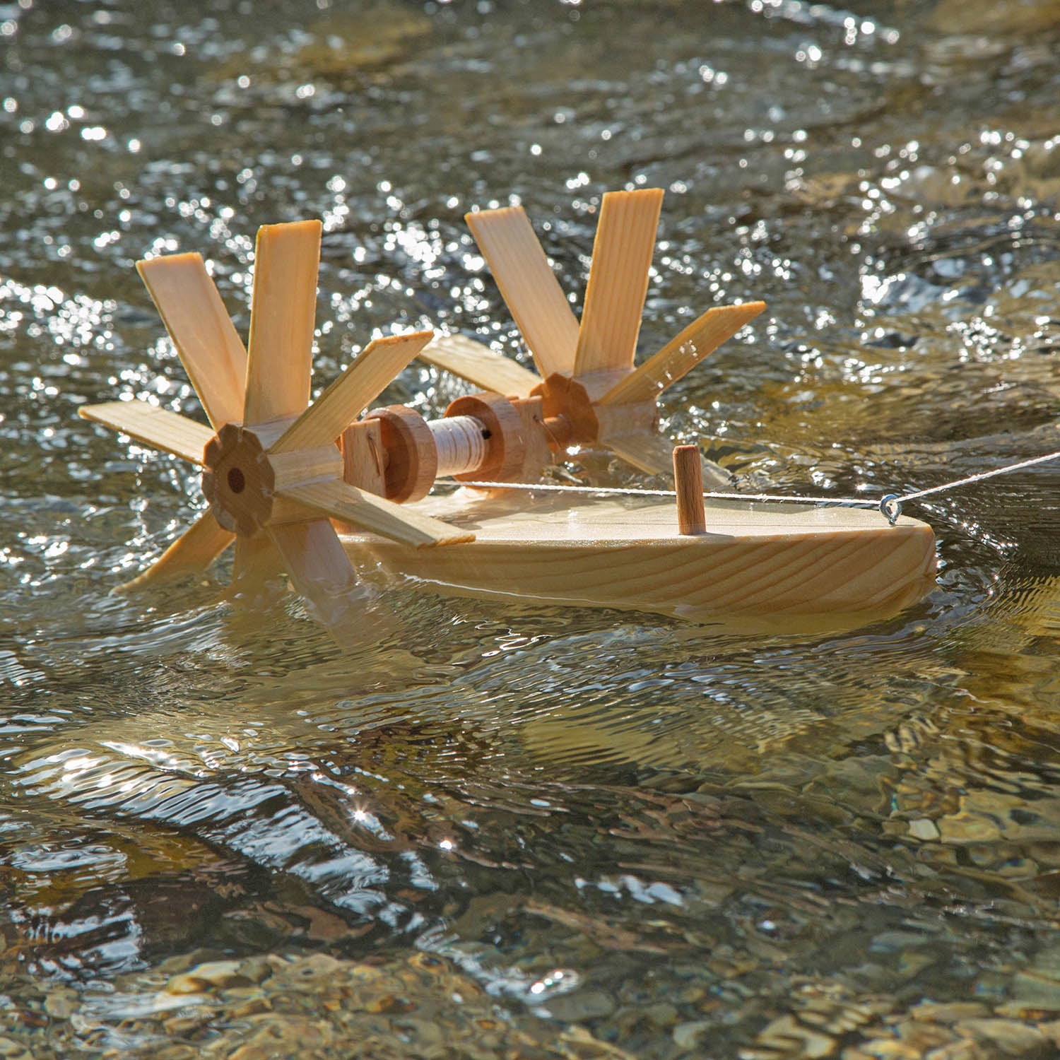 pulling two Kraul Trout Paddle Boats.