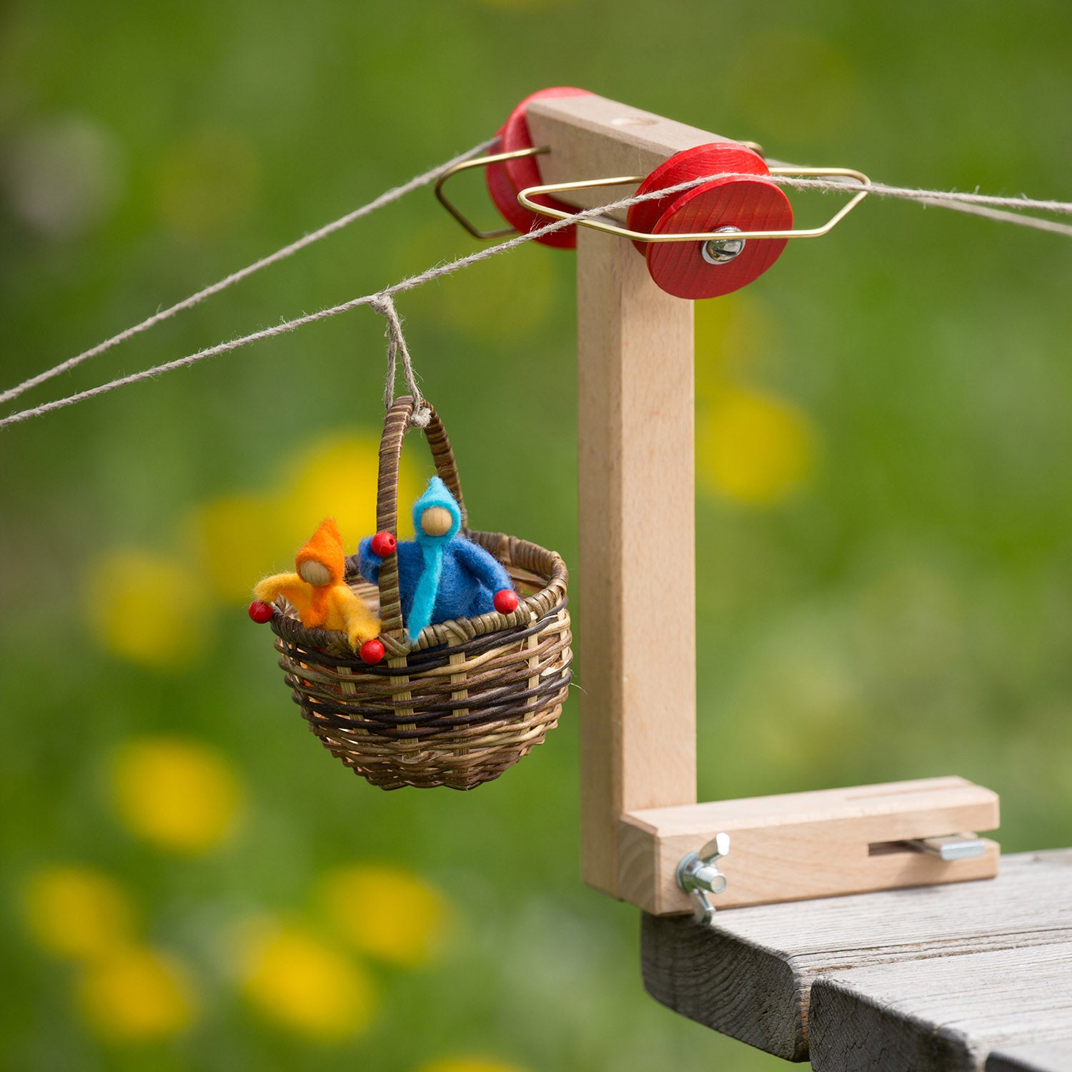 Kraul Cable Car support showing doll passengers in wicker basket