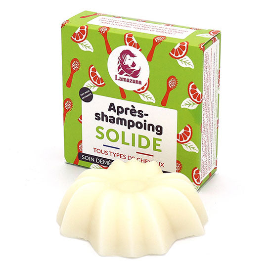 Lamazuna Detangling & Nourishing Solid Conditioner Bar pictured next to box on a plain white background