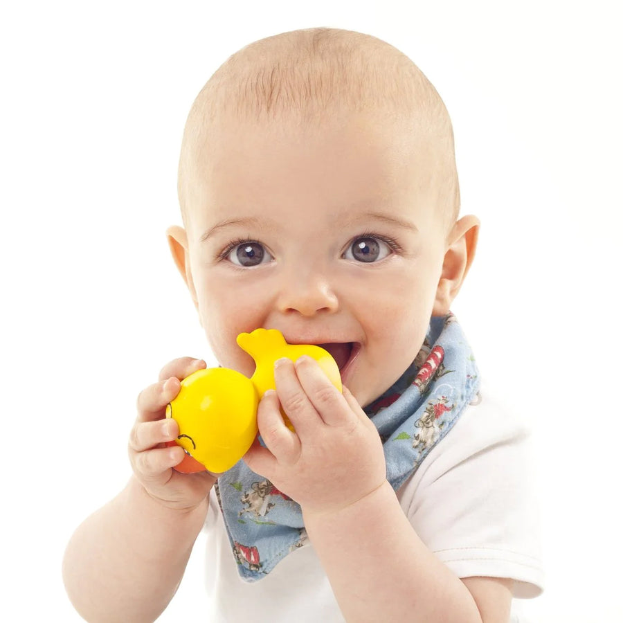 Baby chewing on a Lanco Denzel the duck teether toy