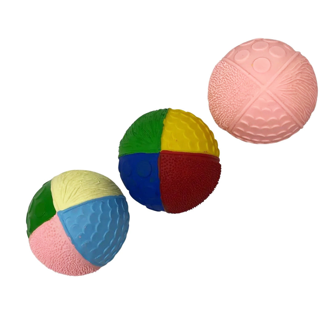 Collection of 3 Lanco sensory balls in various colourways pictured on a plain white background