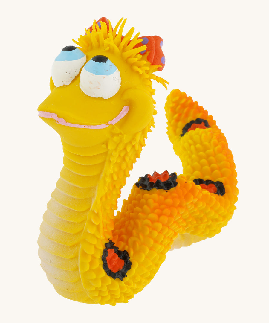 Lanco Maggie The Snake 100% Natural Rubber Sensory Toy - Yellow, on a cream background