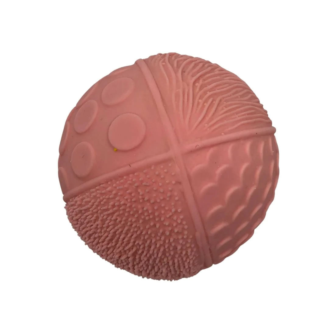 Lanco Pink coloured natural rubber textured Phantasy Sensory Ball pictured on a plain white background