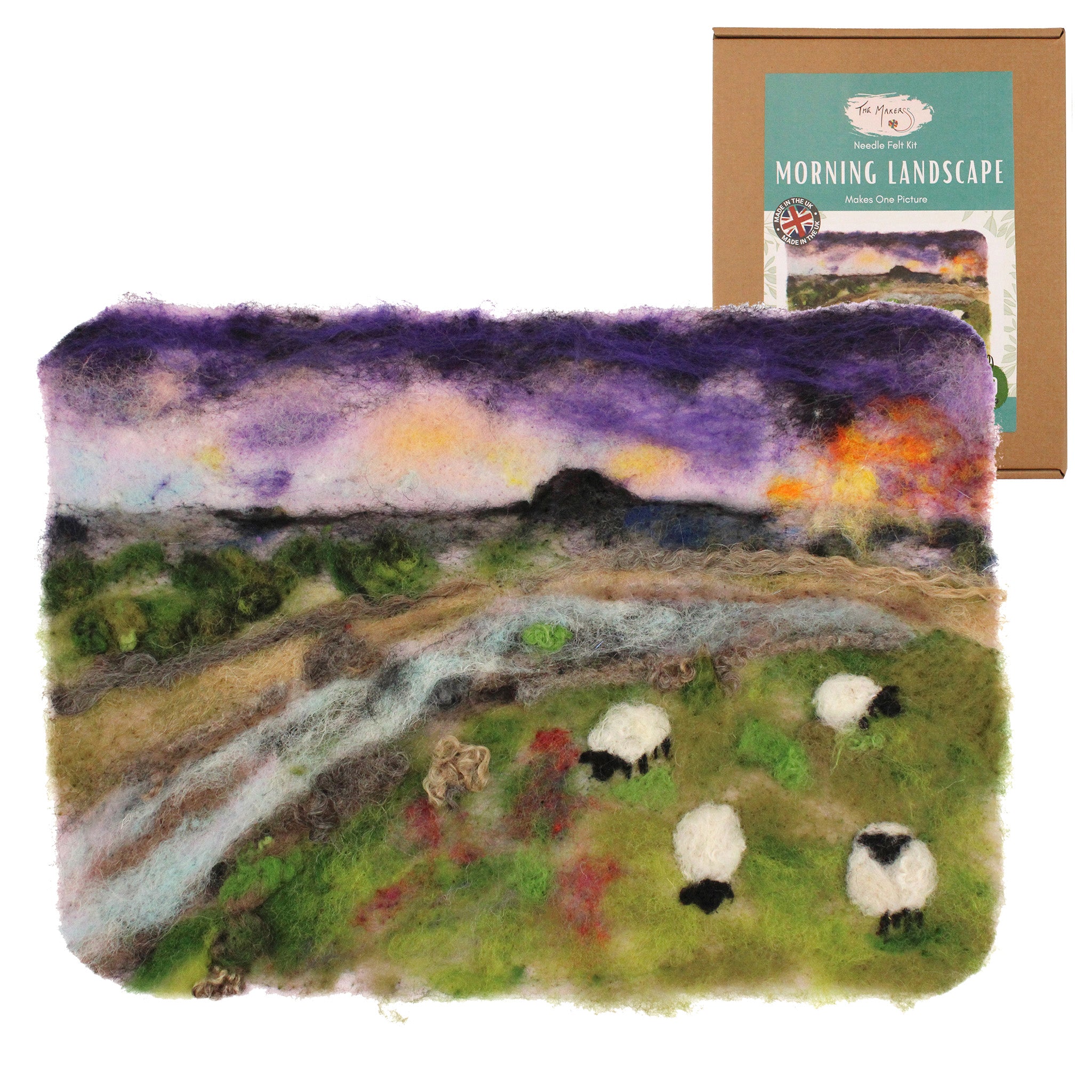 The Makerss - Morning Landscape Needle Felt Crafting Kit. This felting kit creates a beautiful 2d picture of a morning sunrise filled with texture, shading and a lovely purple sky with natural green landscape colours. There are four sheep grazing on the g