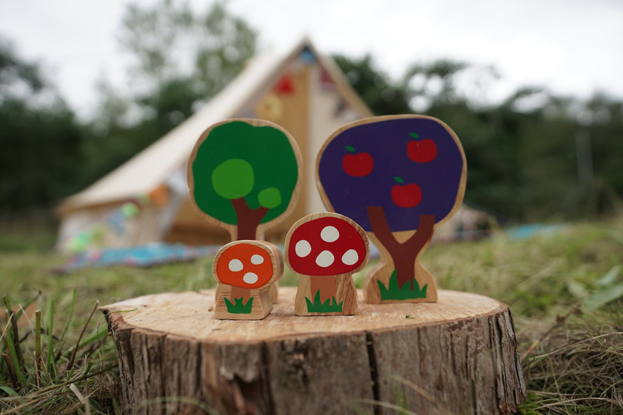 toadstools and apple tree on a brown forest background