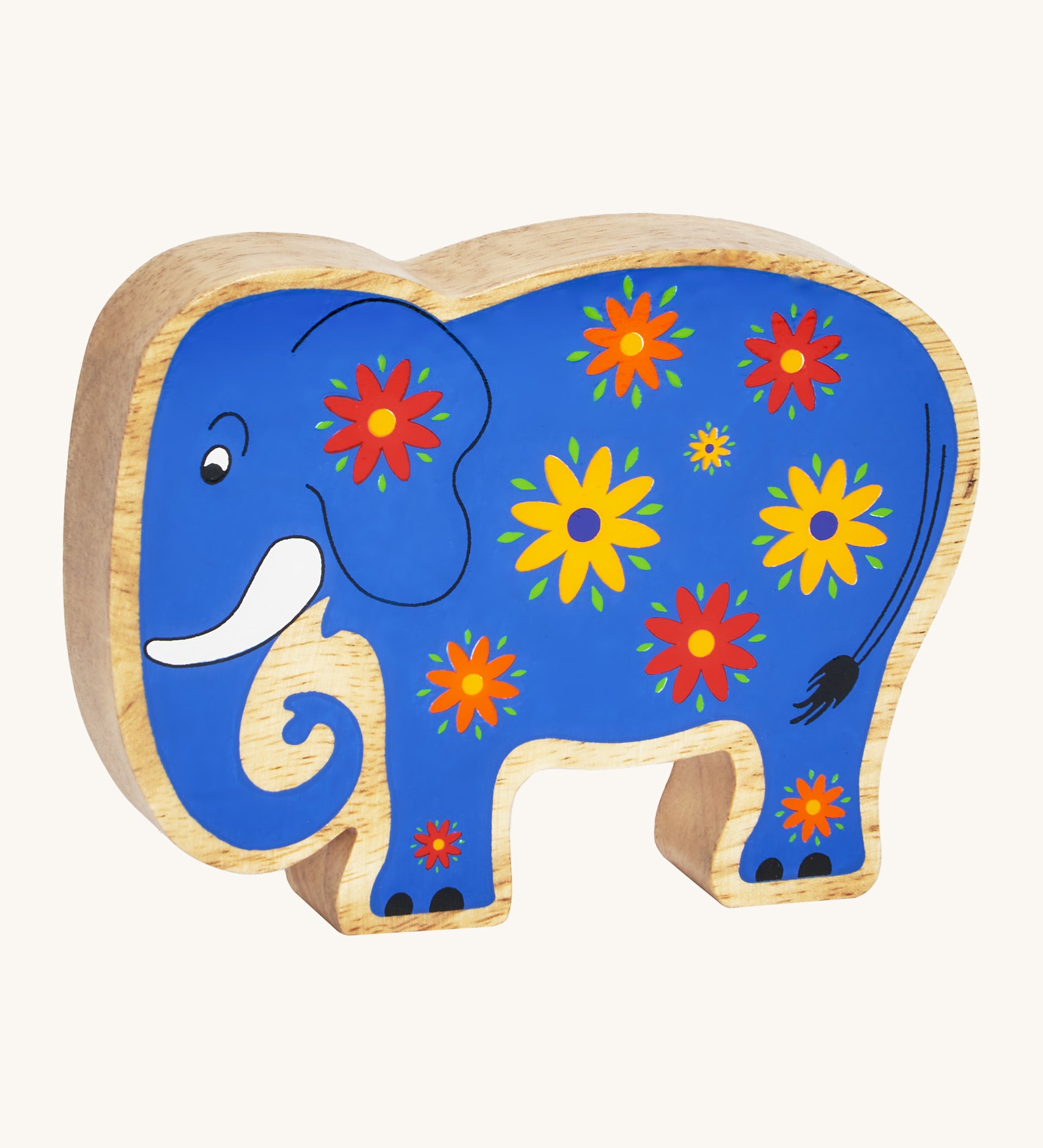 A blue wooden Lanka Kade elephant with yellow and red flowers on a cream background.