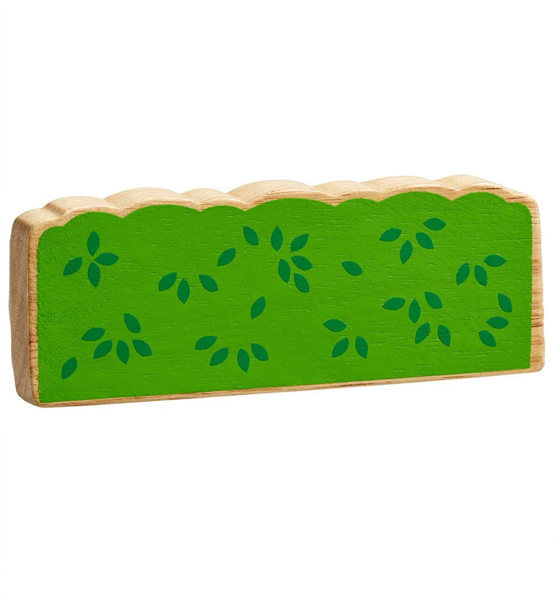 Lanka Kade green wooden hedge toy on a plain background. The hedge is green with darker green leaf details. 