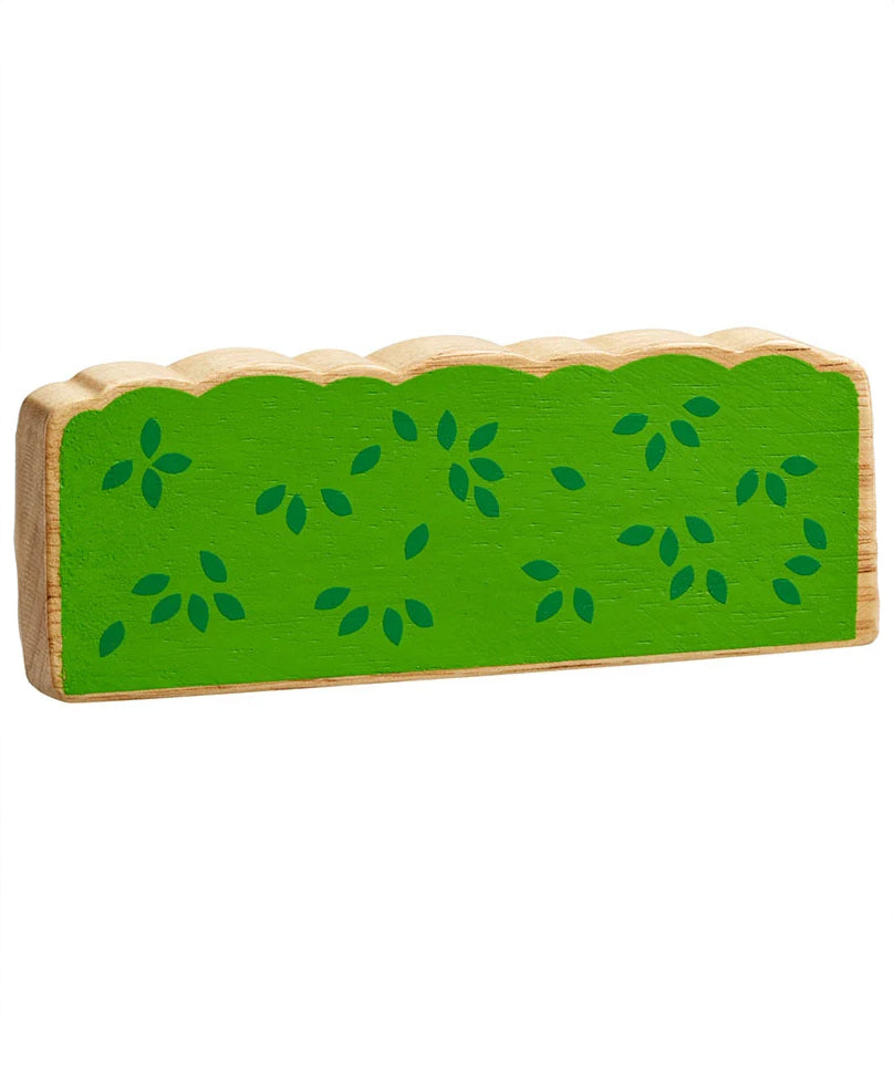 Lanka Kade green wooden hedge toy on a plain background. The hedge is green with darker green leaf details. 