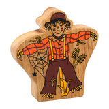 Lanka Kade handmade orange and brown wooden scarecrow figure on a white background