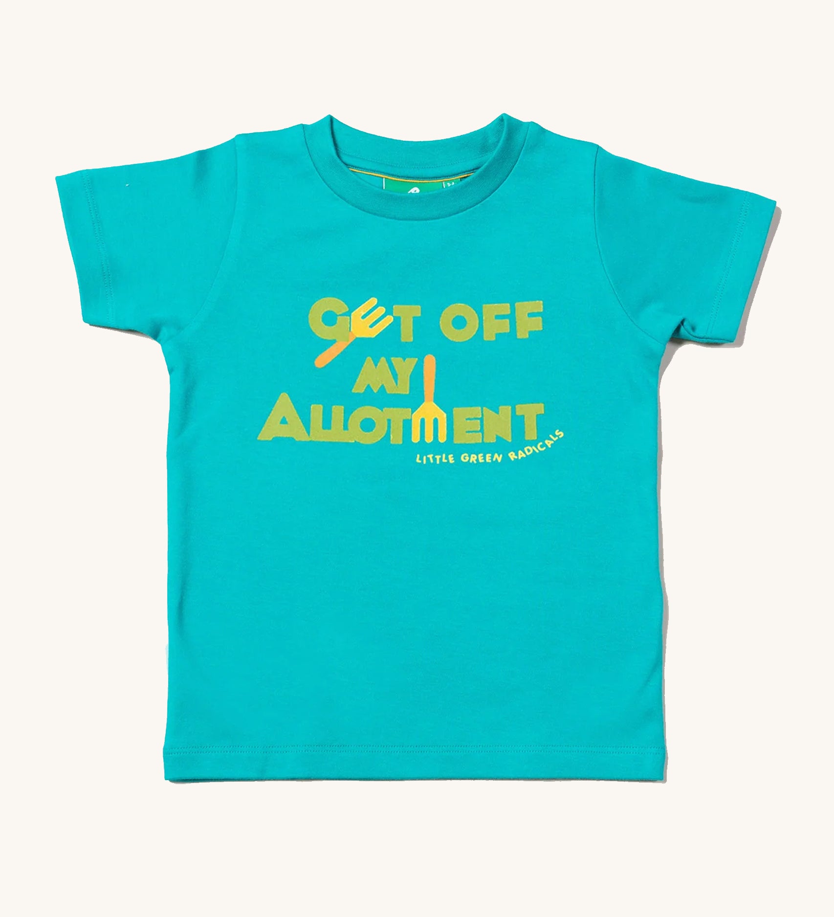 Little Green Radicals Allotment Top, made from organic cotton with a light blue fabric, and green and yellow lettering on a cream background