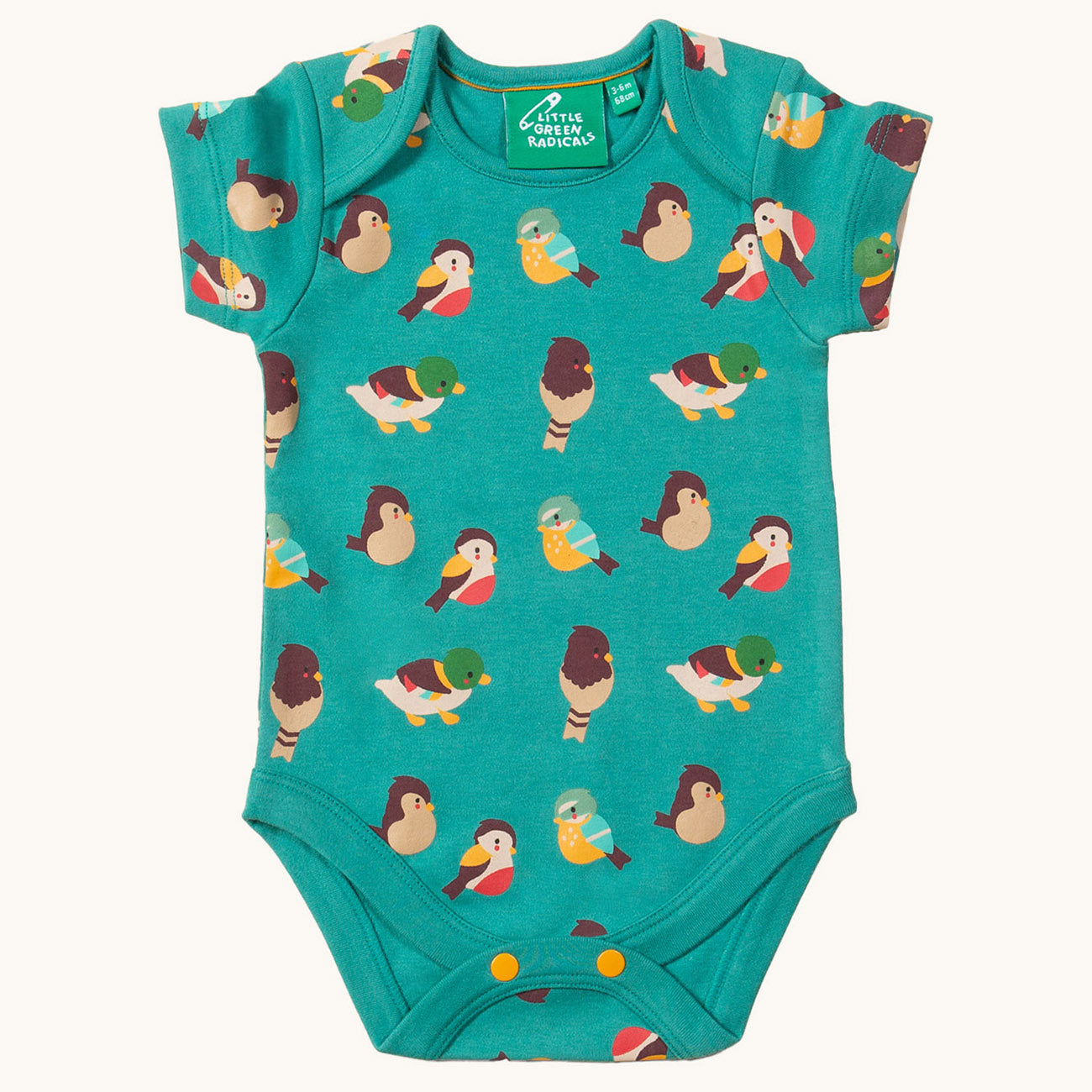  and one in teal green with fun garden bird prints. Both have popper fasteners on the bottom for e